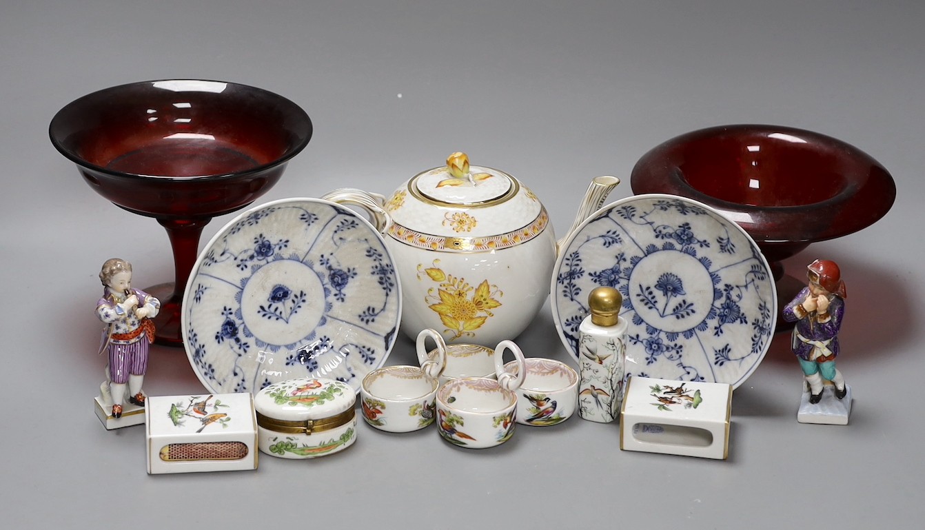 A Meissen figure of boy, two Meissen twin section salts, a Herend teapot and two matchbox holders, two ruby glass comports etc (11), teapot 13 cms high